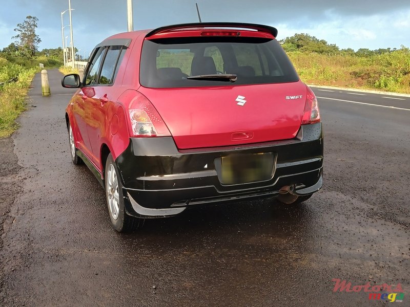 2009' Suzuki Swift photo #2
