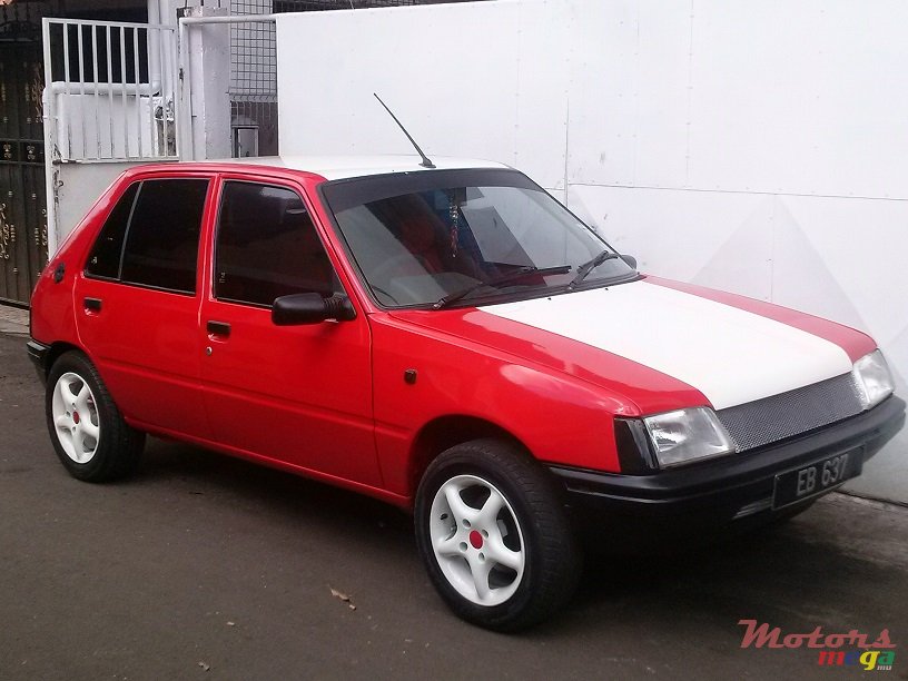 1990' Peugeot 205 Light photo #1