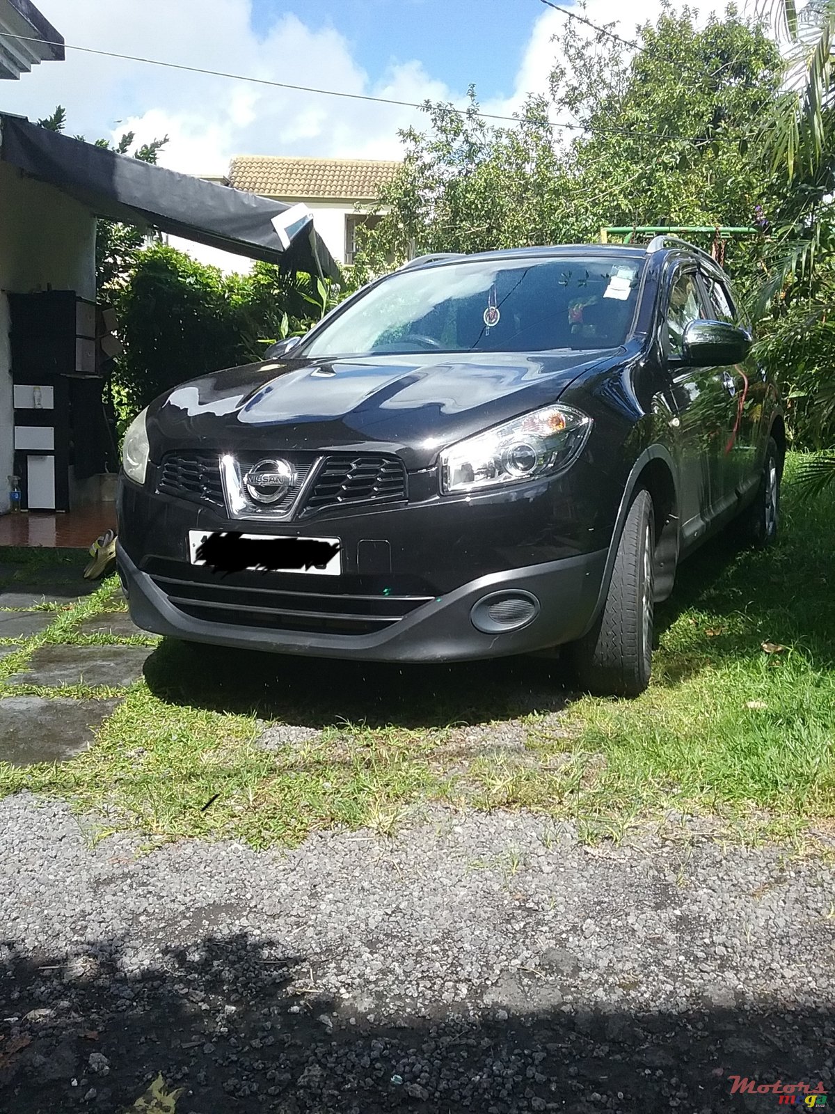 2010' Nissan Qashqai+2 photo #1