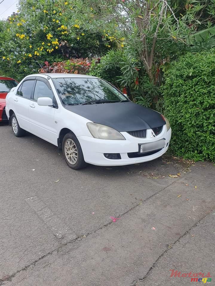 2004' Mitsubishi Lancer Glx photo #7