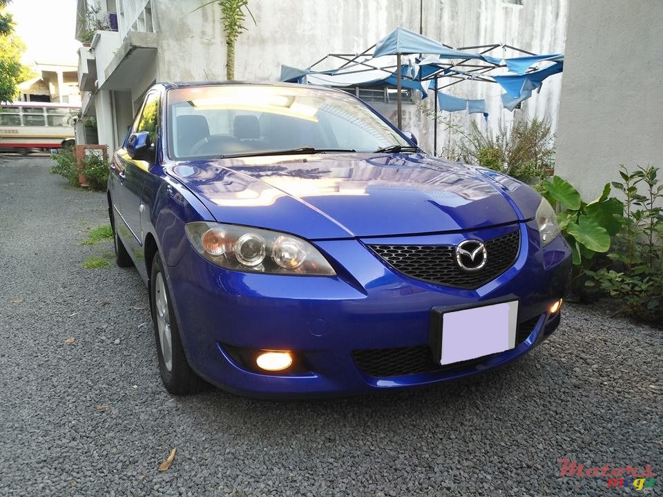 2007' Mazda 3 photo #1