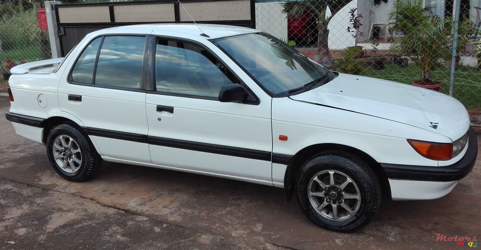 1989' Mitsubishi Lancer photo #1