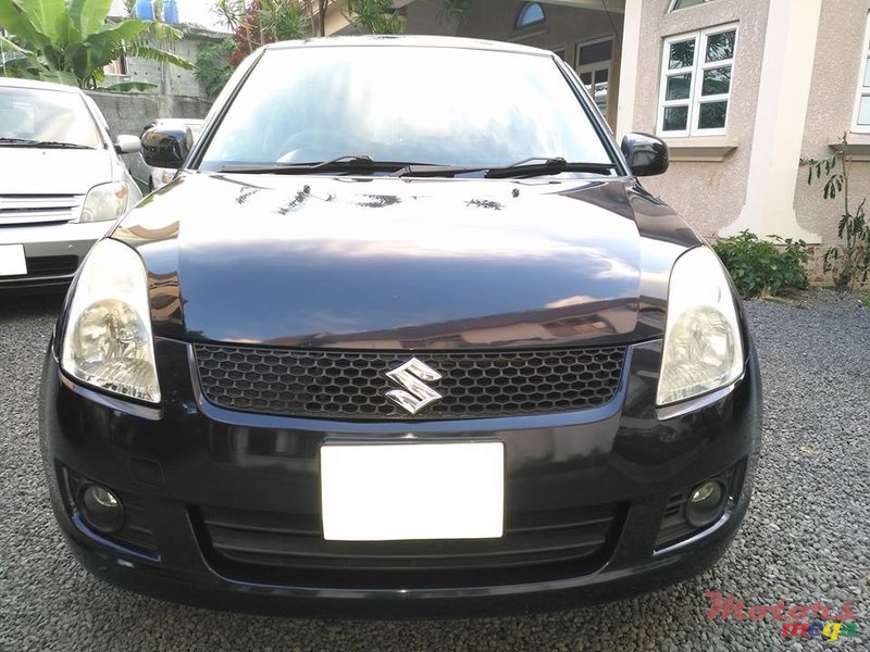 2009' Suzuki Swift photo #1