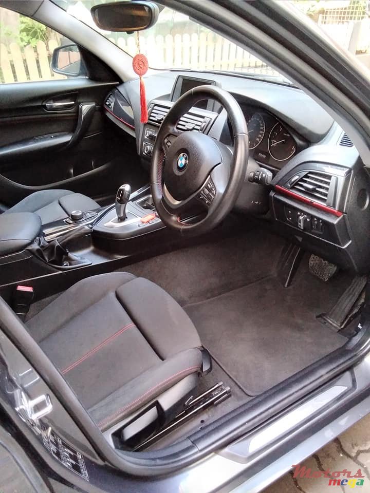 2011' BMW 116 photo #1