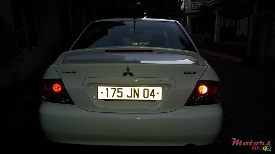 2004' Mitsubishi Lancer GLX photo #6