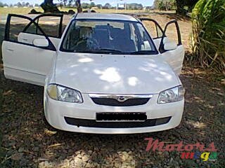 2000' Mazda 323 photo #1