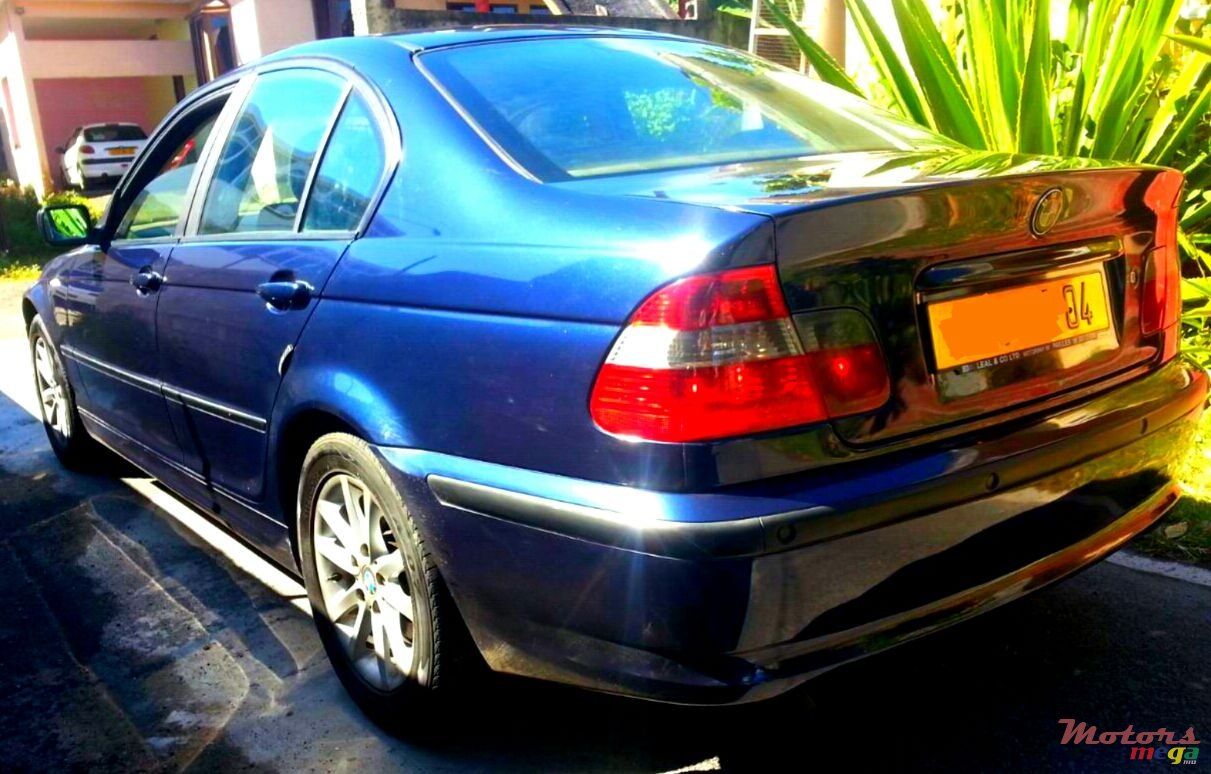 2004' BMW 320 320d photo #2