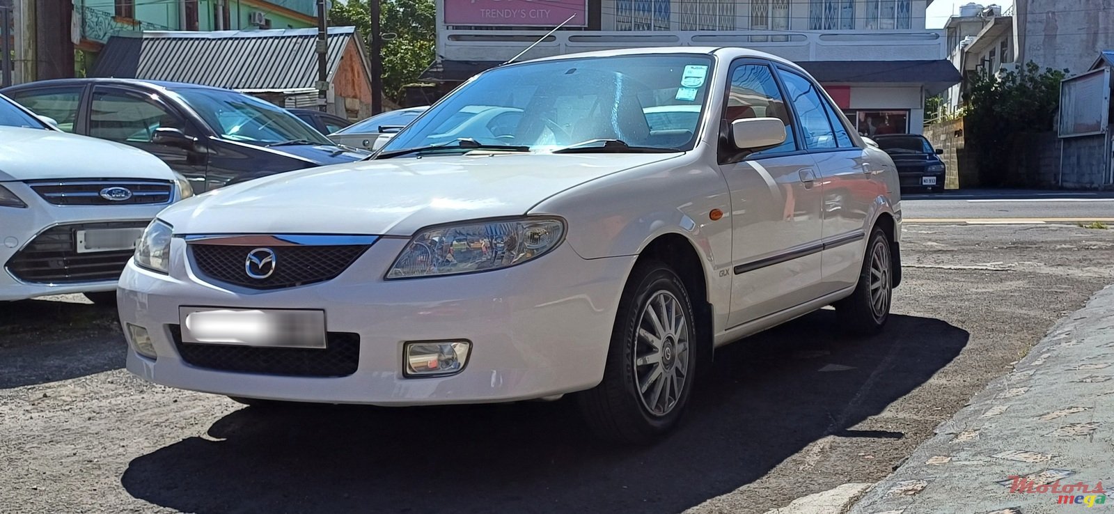 2003' Mazda 323 photo #2