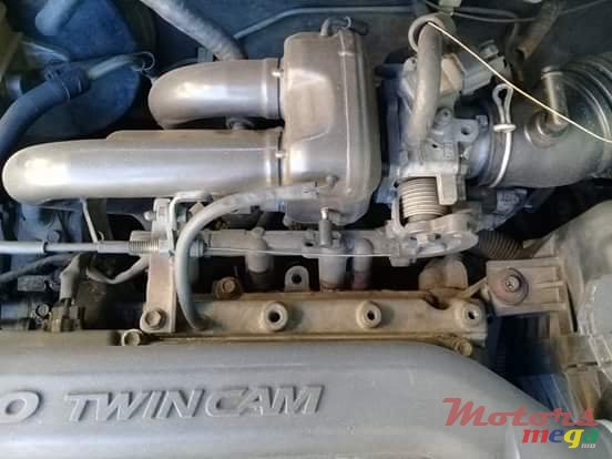 2002' Toyota duet photo #4