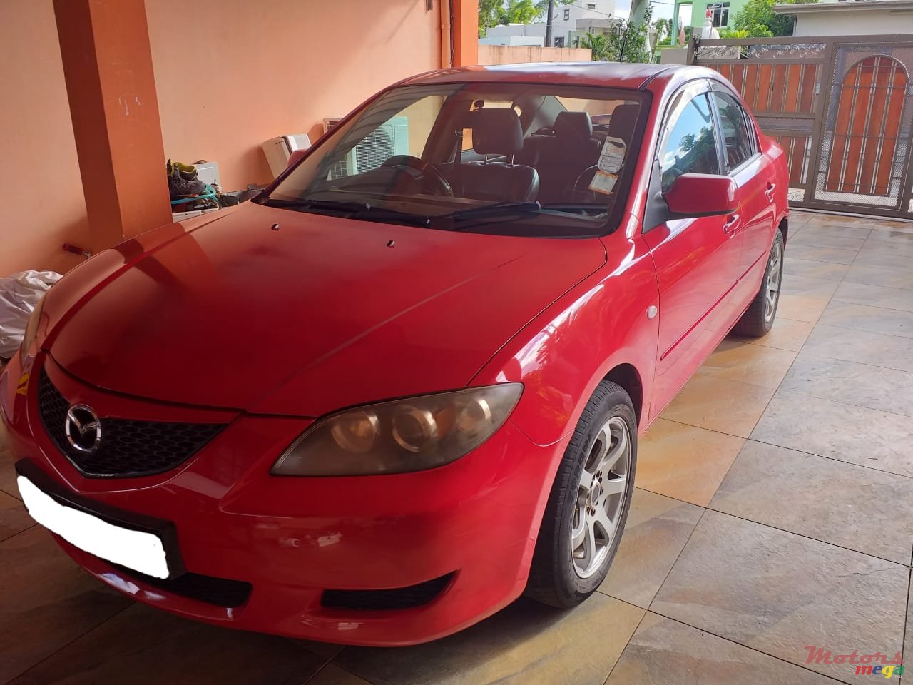 2004' Mazda 3 photo #1