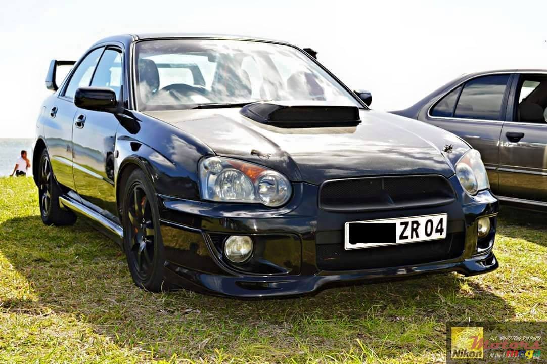 2004' Subaru Impreza 1600 photo #1