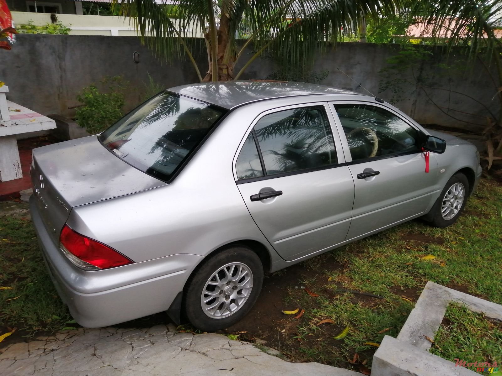 2003' Mitsubishi Lancer Sport exhaust, aftermarket air photo #2