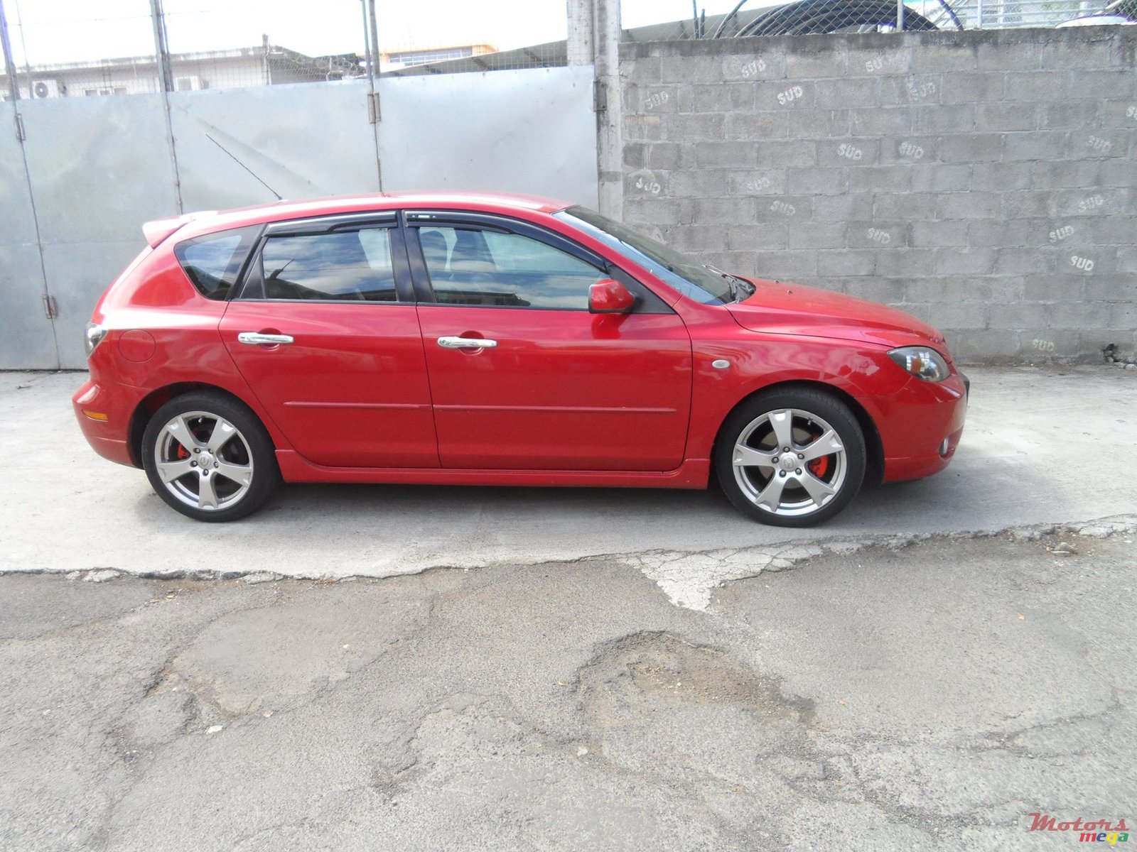 2004' Mazda 3 photo #1