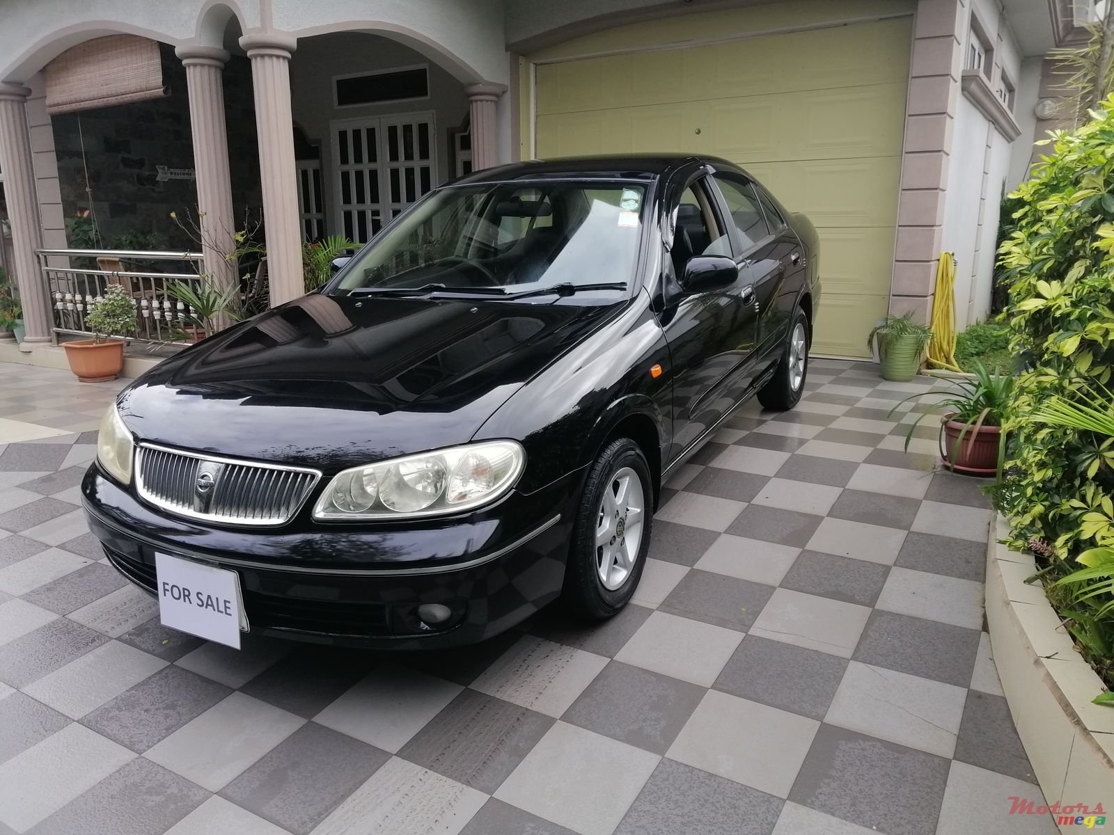 2004' Nissan Sunny photo #1