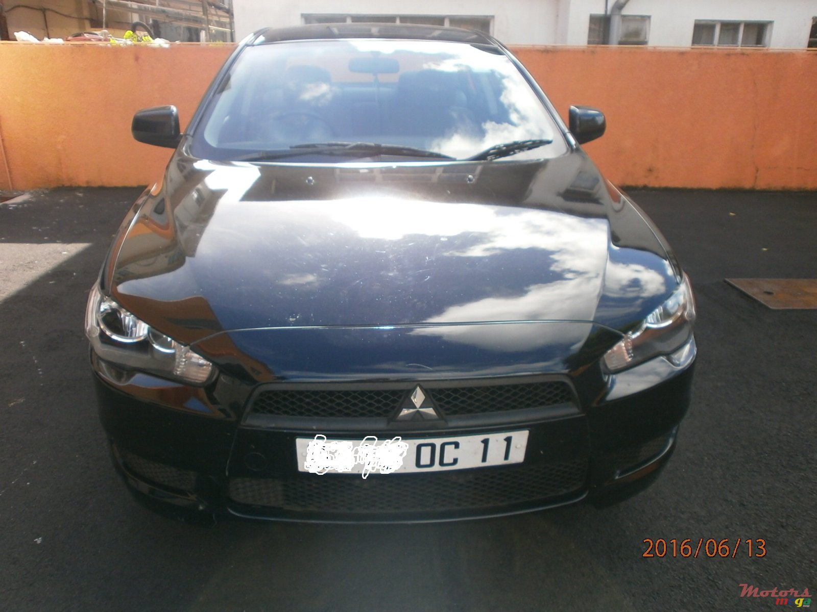 2011' Mitsubishi Lancer Ex photo #1