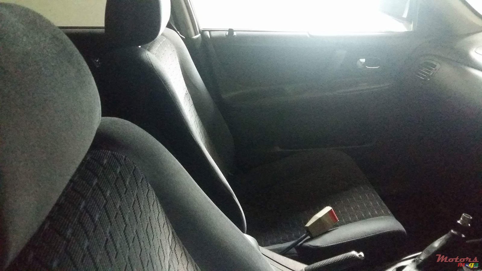 2001' Mazda 323 Hatch Back photo #3