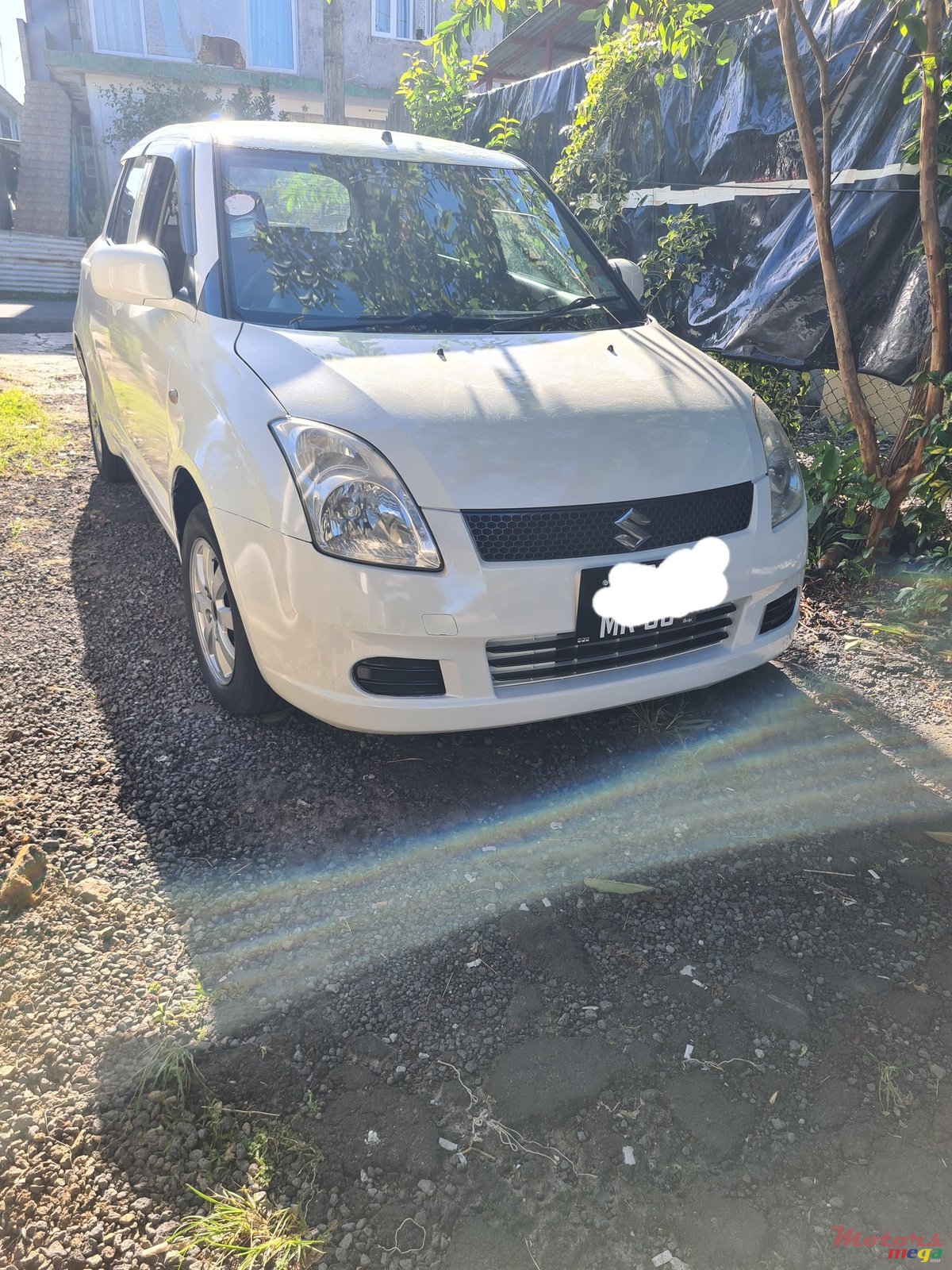 2009' Suzuki Swift photo #3
