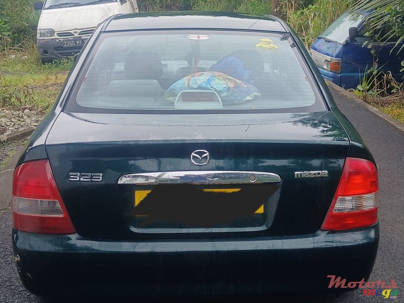 2000' Mazda 323 photo #1