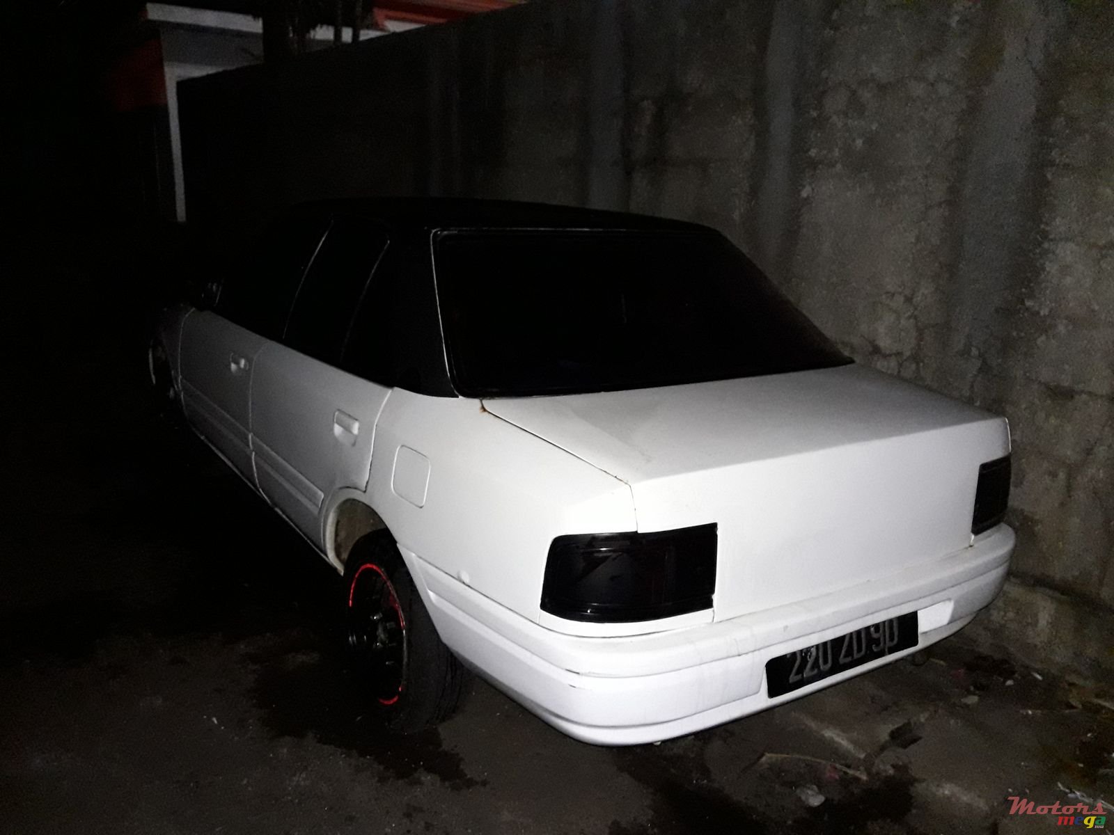 1990' Mazda 323 photo #1