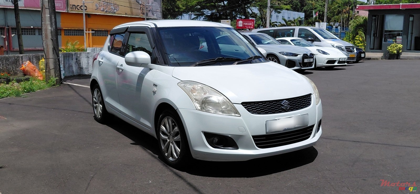 2015' Suzuki Swift photo #1