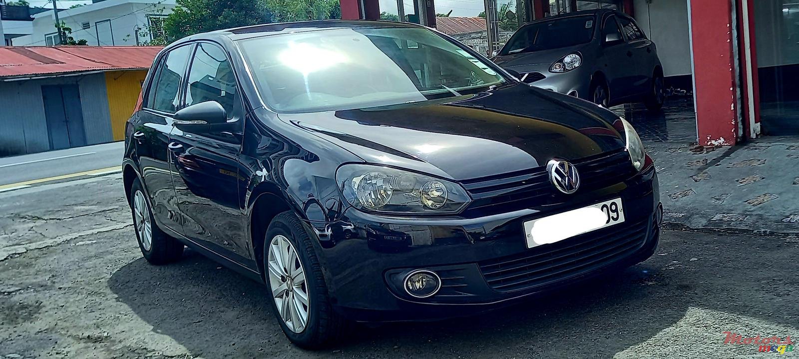 2009' Volkswagen Golf VI photo #1