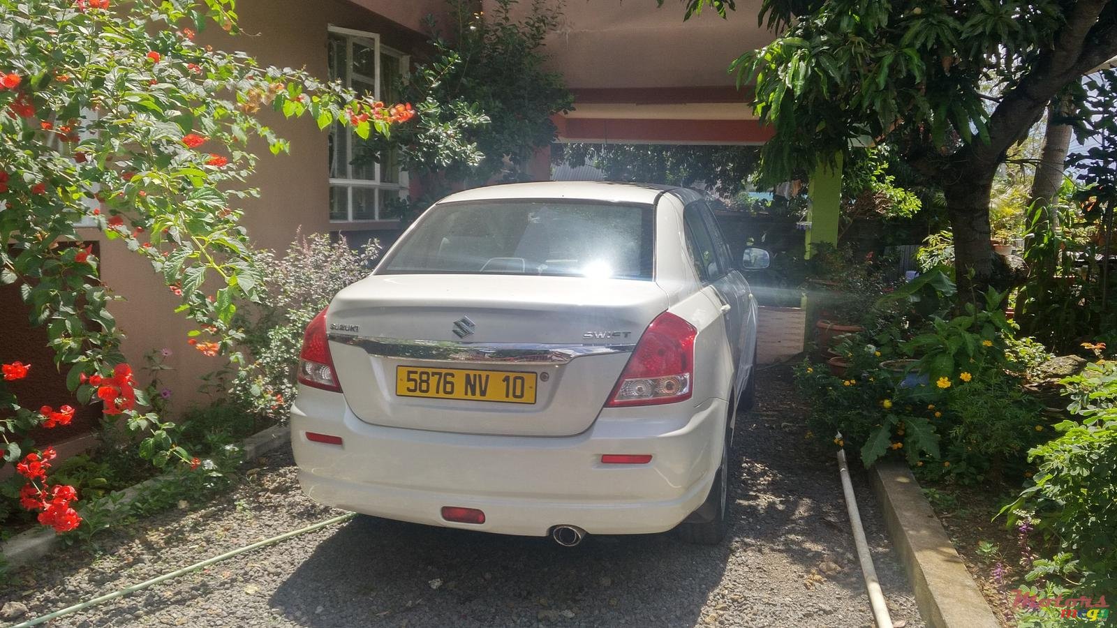 2010' Suzuki Dzire photo #3