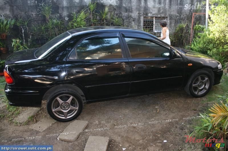 2001' Mazda 323 photo #1