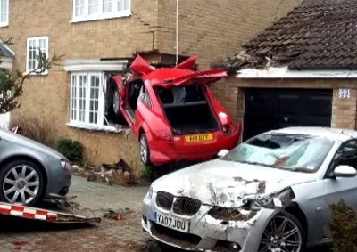 VIDEO: Audi TT Crashes into House