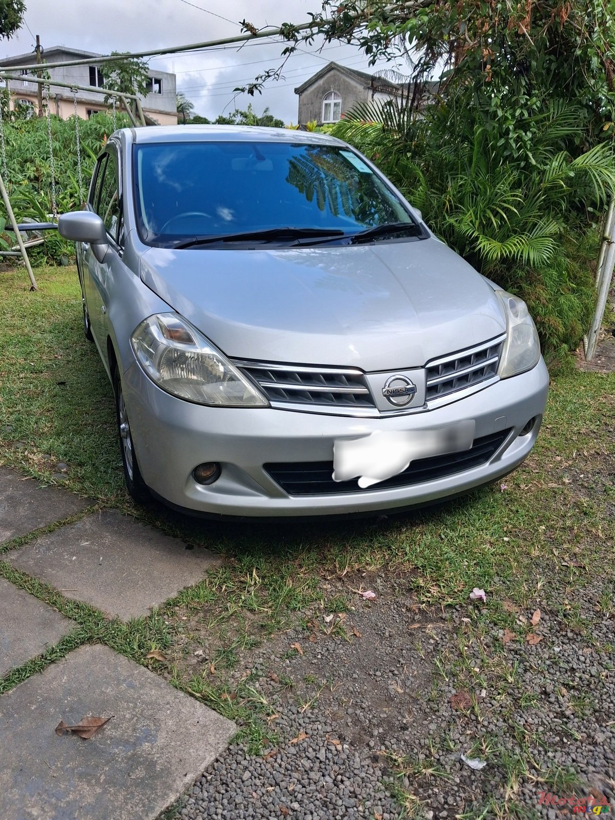 2012' Nissan Tiida photo #1