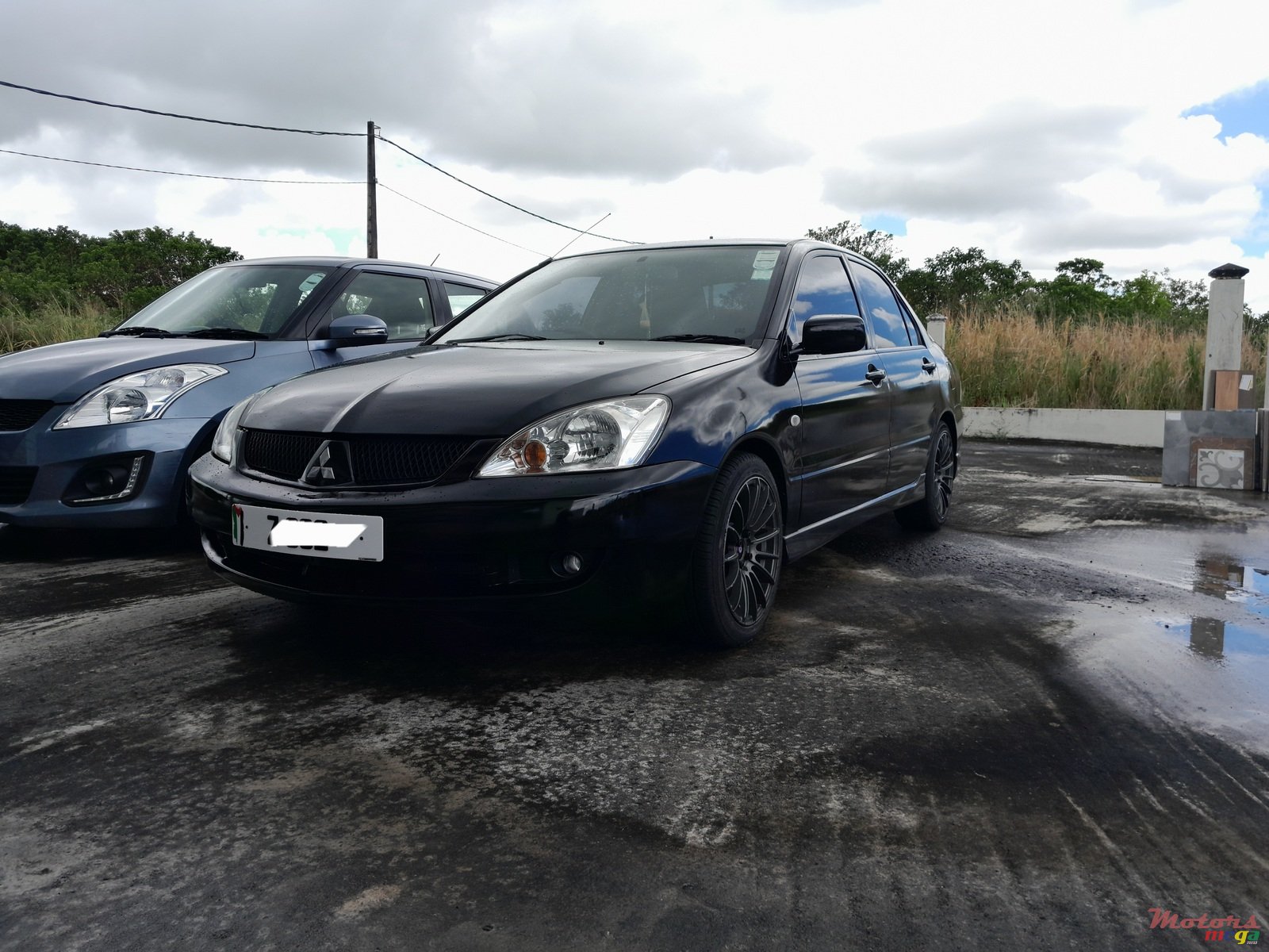 2004' Mitsubishi Lancer photo #7