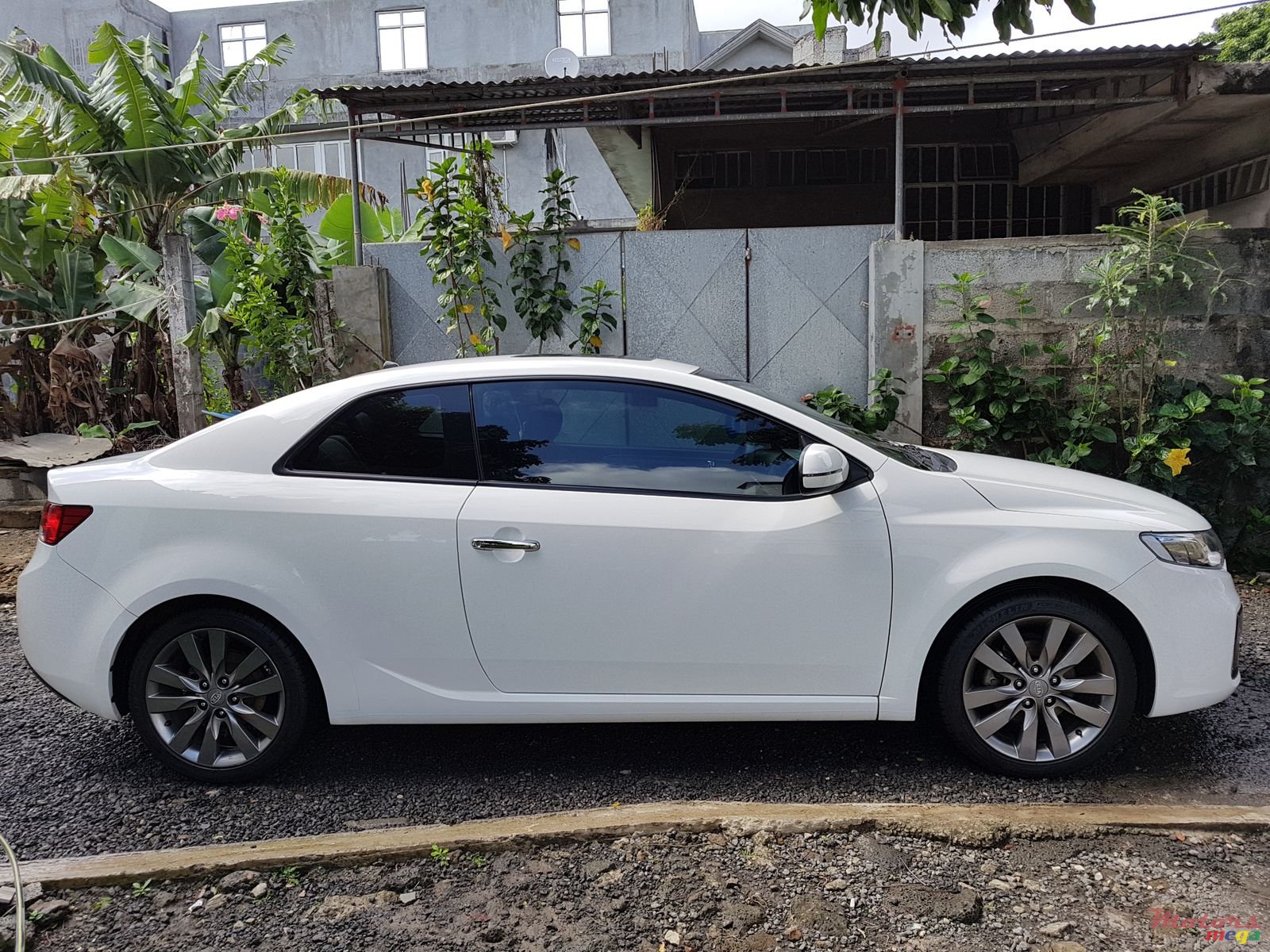 2012' Kia Koup photo #1
