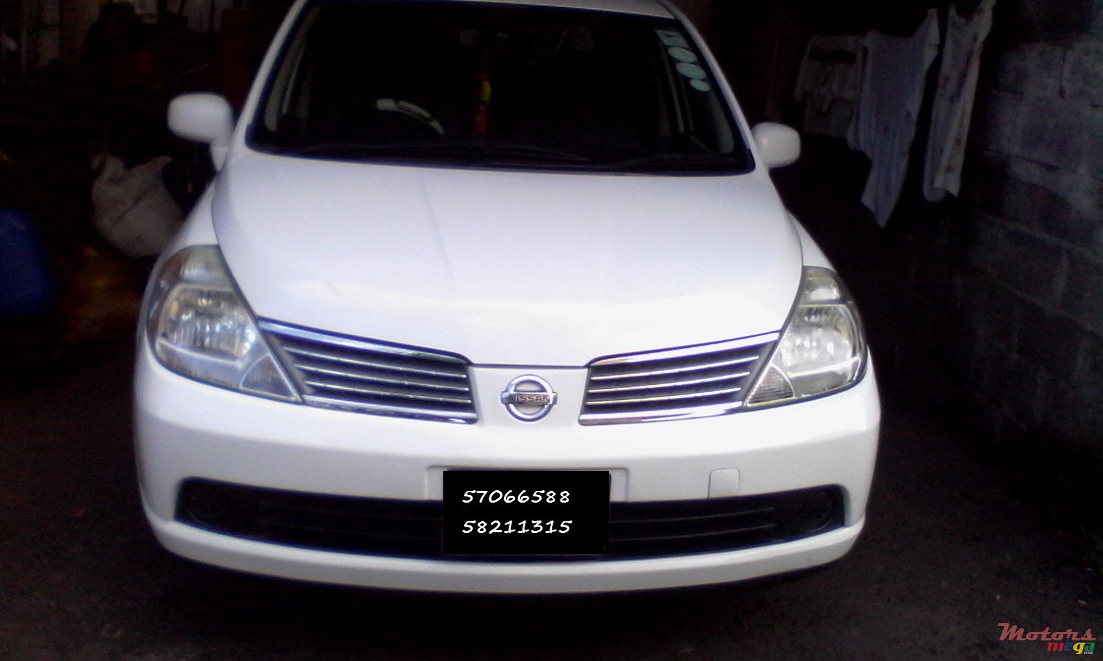 2007' Nissan Tiida photo #1