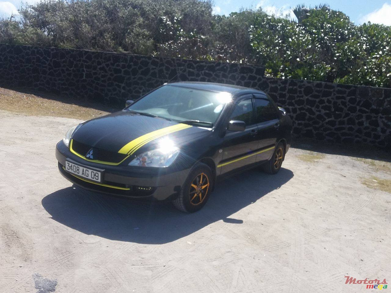 2009' Mitsubishi Lancer photo #1