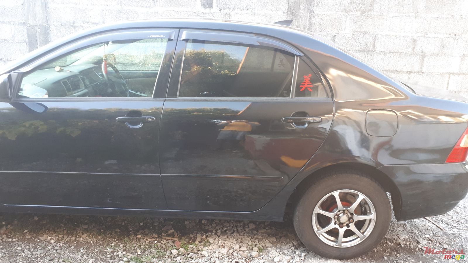 2002' Toyota Corolla NZE photo #2