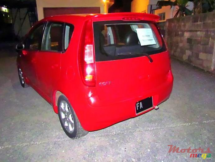 2004' Mitsubishi Colt photo #2