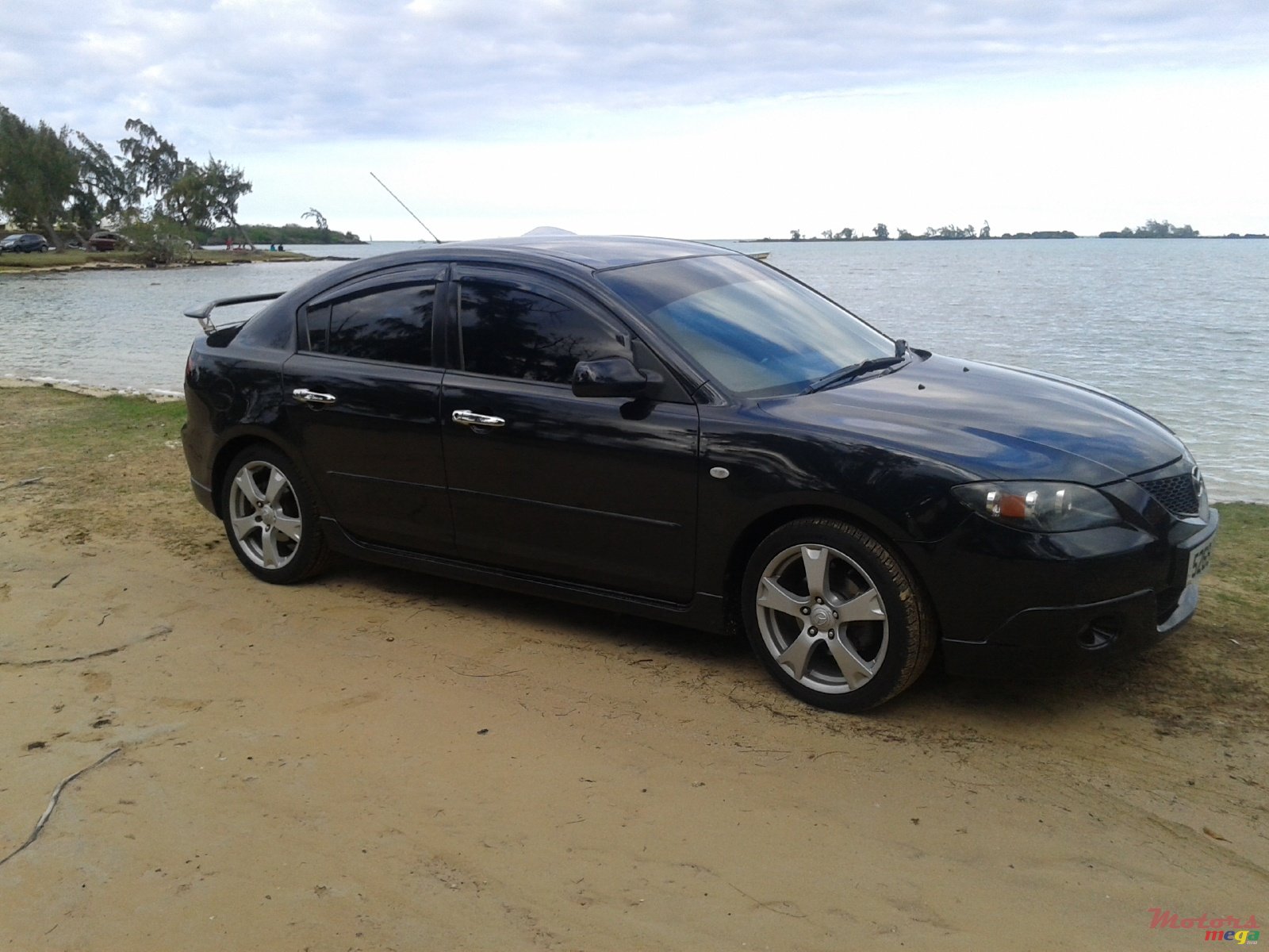 2004' Mazda 3 photo #1