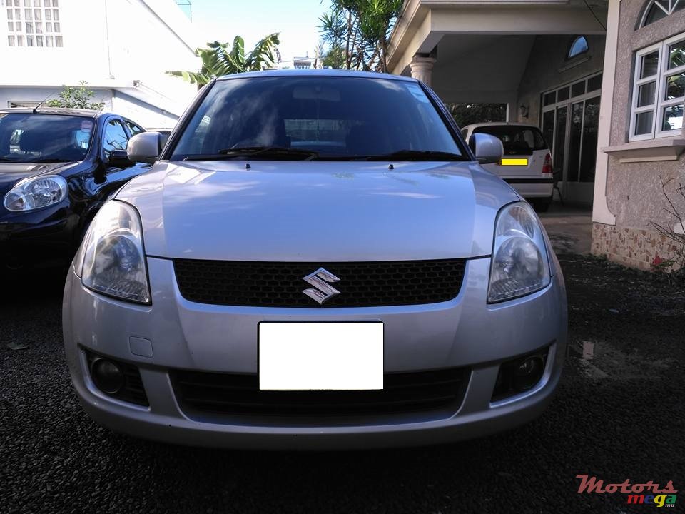 2009' Suzuki Swift photo #1