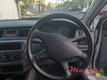 2012' Mitsubishi Lancer photo #1