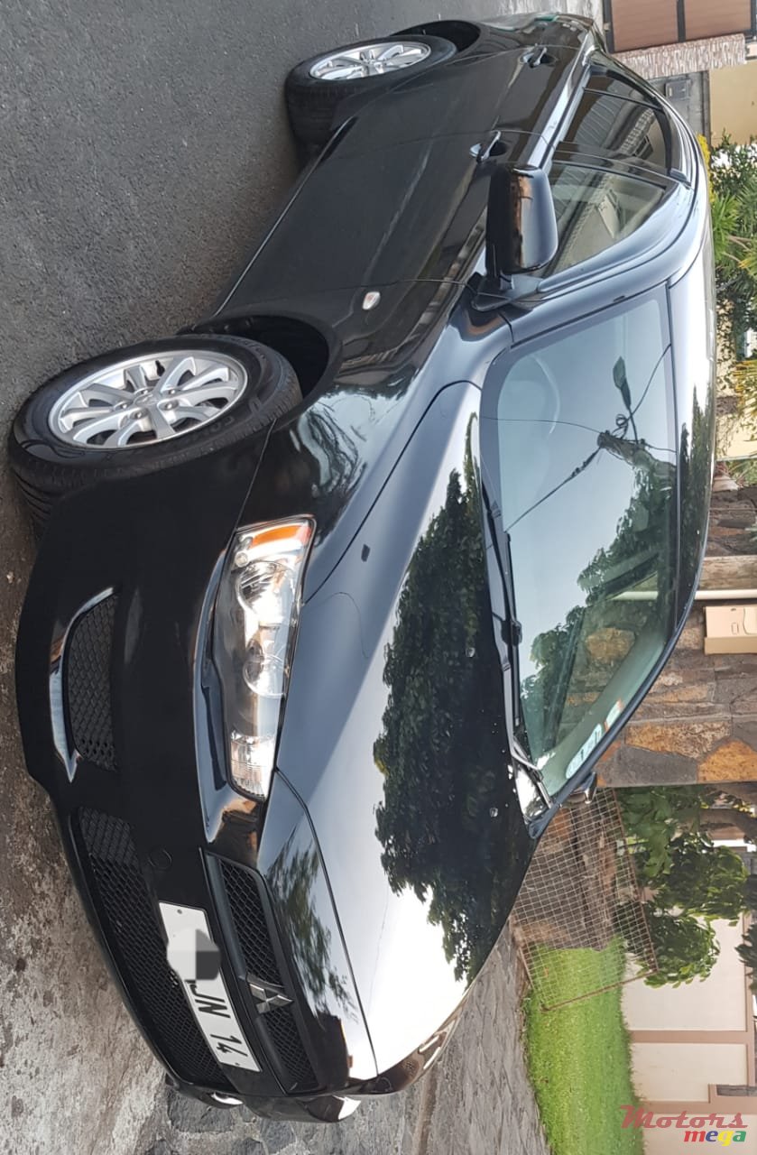 2014' Mitsubishi Lancer X photo #1