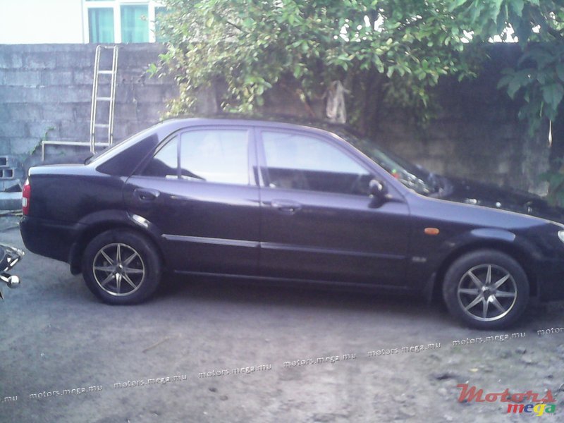 2004' Mazda 323 photo #2