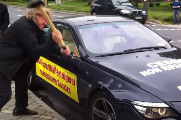 Watch Man Destroy His M6 'Lemon' with a Sledgehammer and Ax