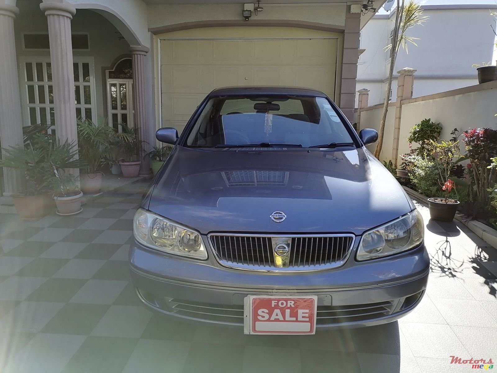 2004' Nissan Sunny photo #1