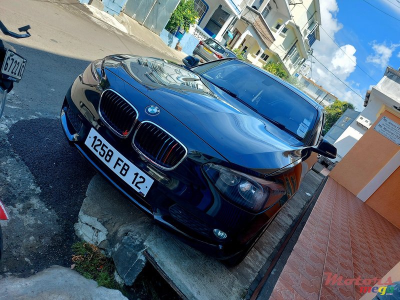 2012' BMW 116 Dorigin photo #5