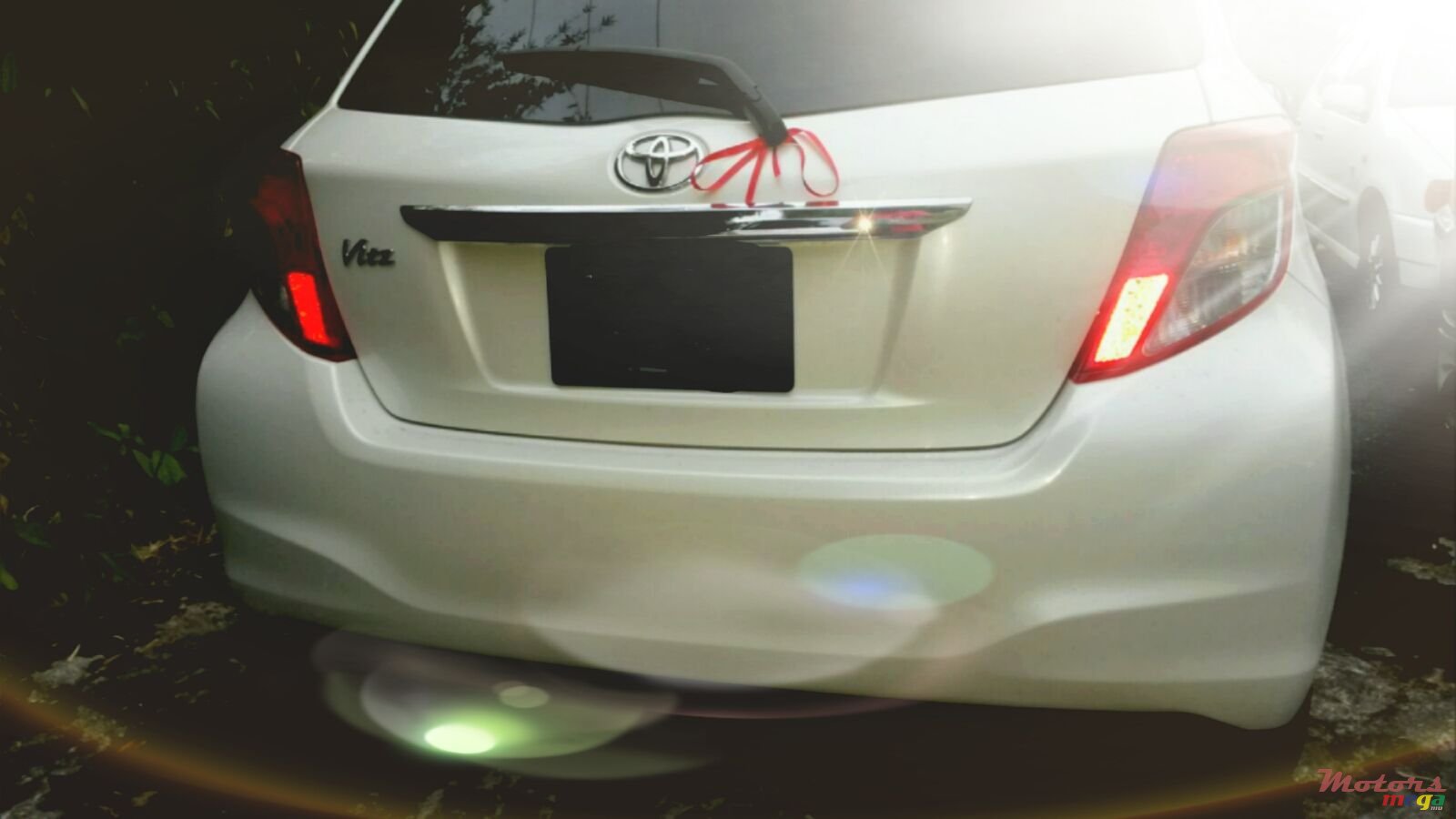 2011' Toyota Vitz photo #6