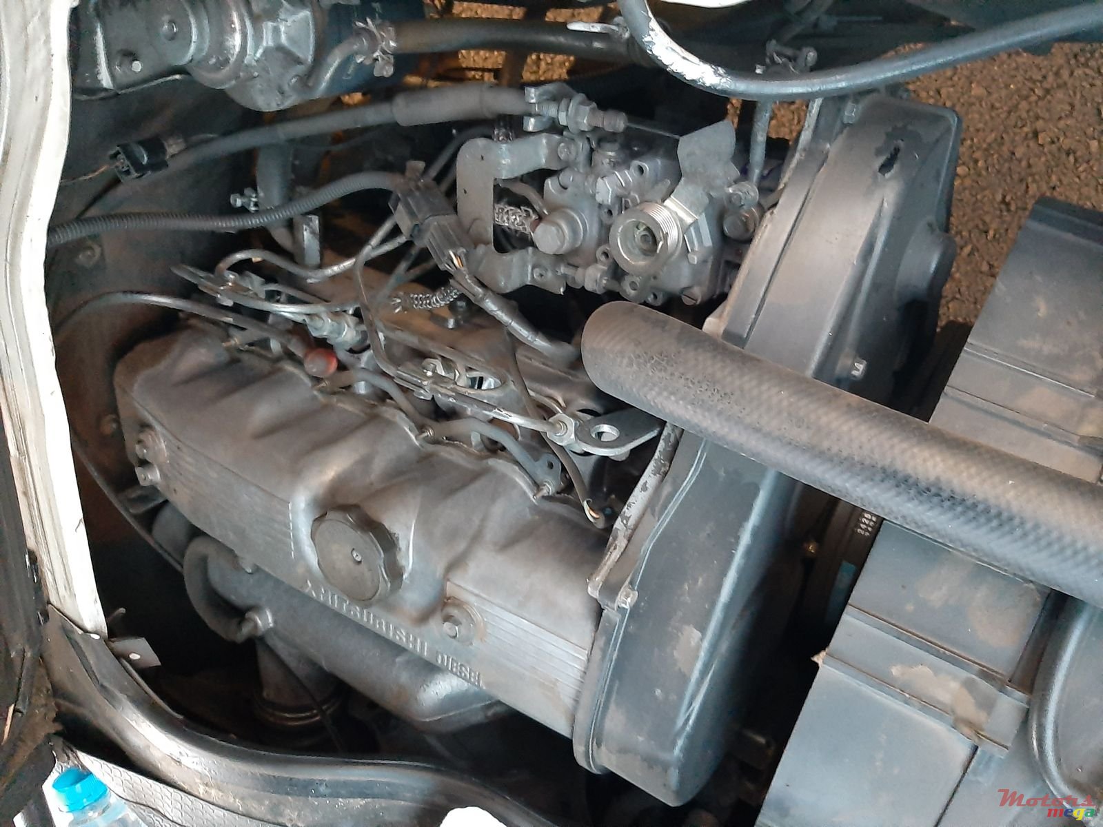 2009' Mitsubishi L300 photo #3