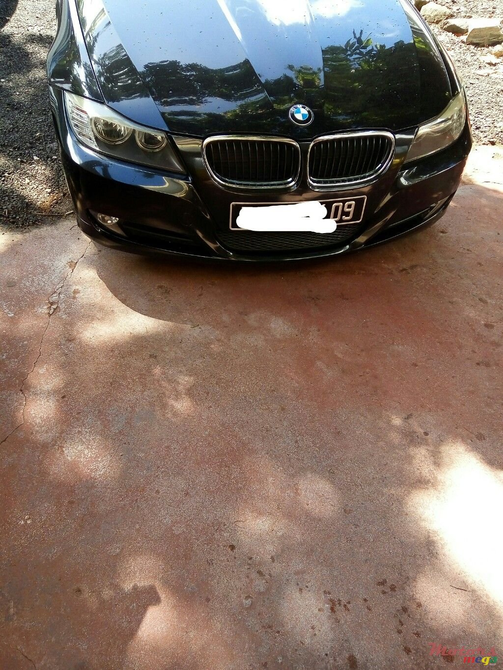 2009' BMW 318 photo #1