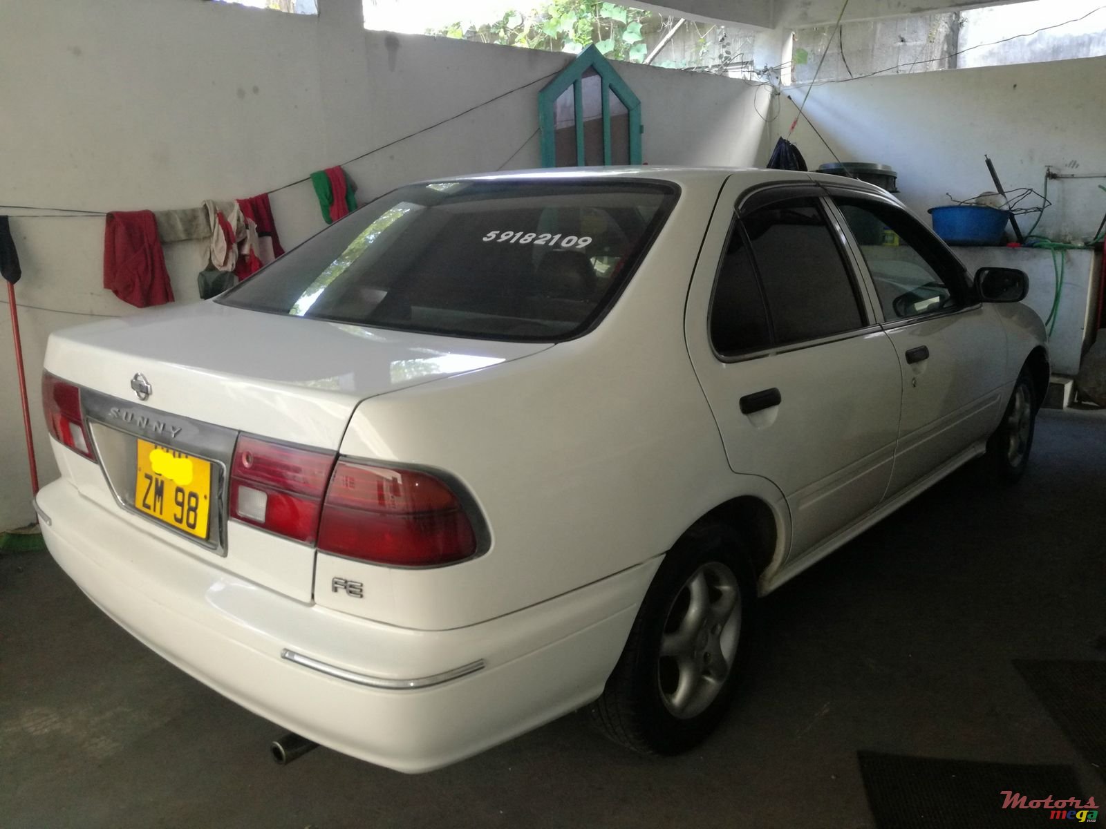 1998' Nissan Sunny photo #1
