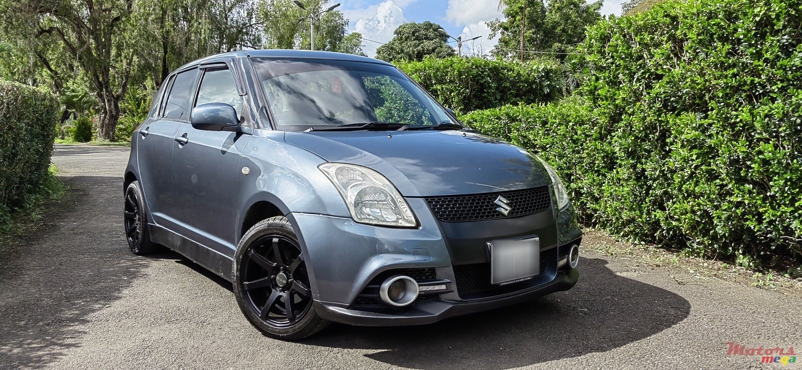 2009' Suzuki Swift photo #1