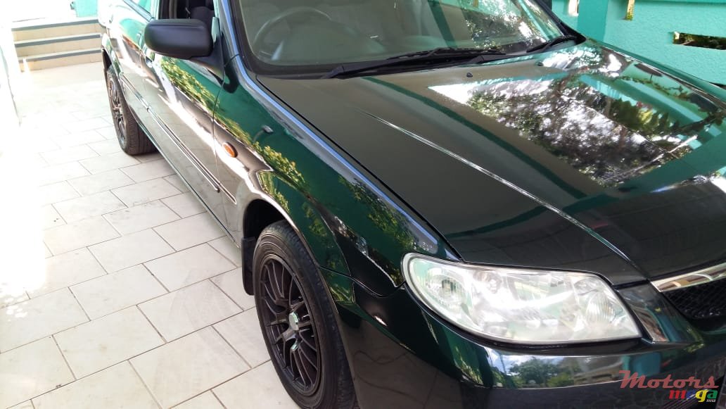 2002' Mazda 323 photo #3