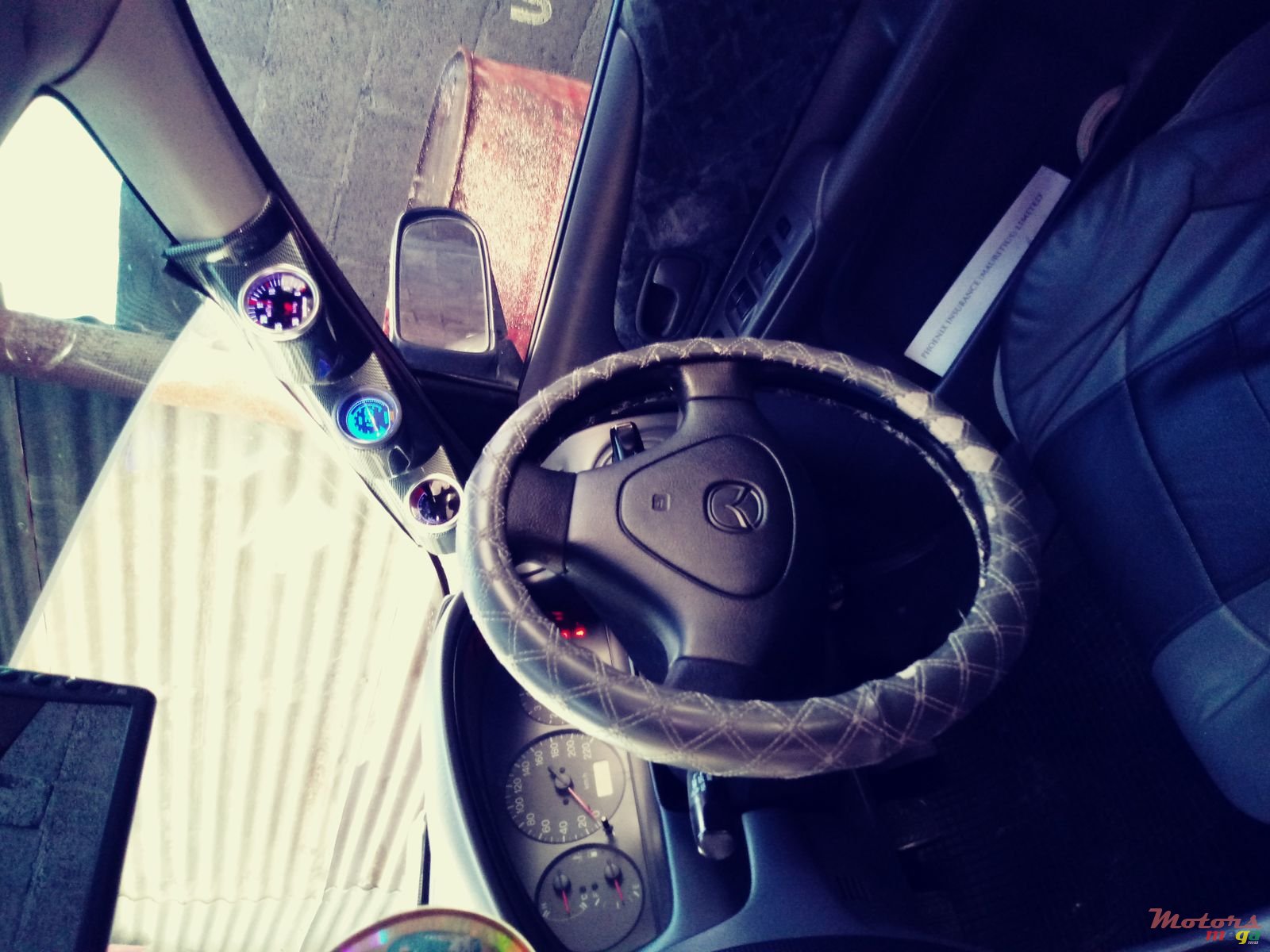 1999' Mazda 323 photo #7